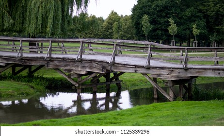 Wooden Bridge Leading To The Park Side View