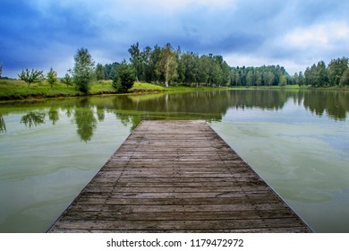 Wooden bridge on the lake. - Powered by Shutterstock