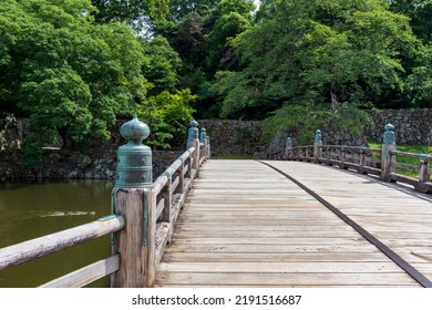 A Wooden Bridge Over The Moat Of Hikone Castle