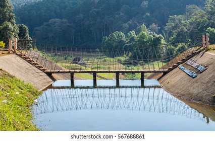 Wooden Bridge Over On Reservoir At Pang Oung