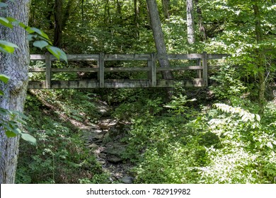 A wooden bridge at Rock Bridge Memorial State Park near Columbia, Missouri.