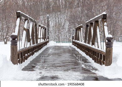 Wooden Bridge With Snowy Surface