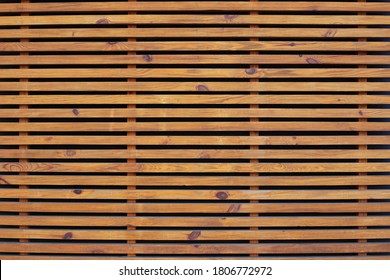 Wooden Brown Bars. Oak Slats On Wall, Decorative Border. Texture Of The Light Wood Boards Lie Horizontally. Wood Background