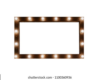 wooden brown frame of dressing mirrors with light bulbs on a white background isolated. place for text