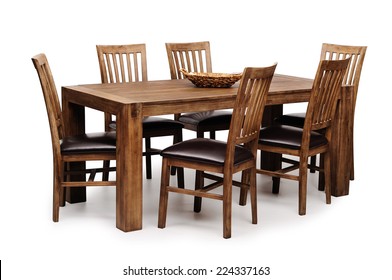 Wooden brown table and six chairs shot on white background