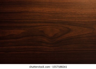 Wooden Brown Tabletop Desk With Wood Grain Texture And Large Wood Knot