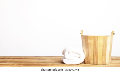 Wooden bucket and towels - Shutterstock ID 376991746