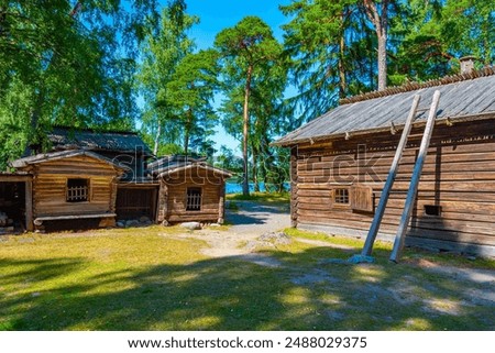 Wooden buildings at Seurasaari Open-Air Museum in Helsinki, Finland.