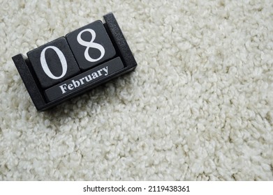 Wooden Calendar From Blocks On A White Textile Background With Copy Space. 8th Of February. Day Of Russian Science. International Day For Safe Internet