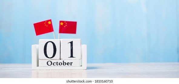 Wooden calendar of October 1st with miniature China flags. National Day of the People's Republic of China, public Nation holiday Day and happy celebration concepts - Powered by Shutterstock