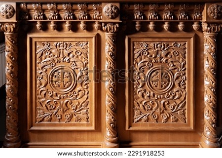 Wooden carved panel of ancient furniture