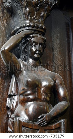 wooden carving of woman