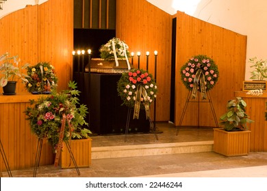 Wooden caseket at a funeral - funereal ceremony