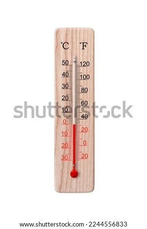 Wooden celsius and fahrenheit scale thermometer isolated on a white background. Ambient temperature zero degrees