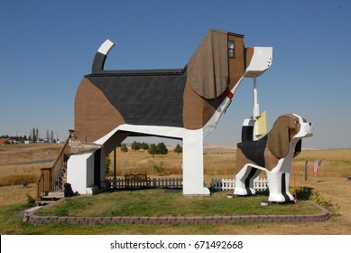 Wooden Chainsaw Carved Art In Dog Bark Park In Cottonwood, Idaho