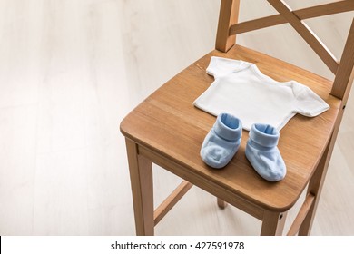 Wooden Chair With Baby Items