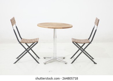 Wooden Chairs And Cafe Table