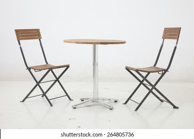 Wooden Chairs And Cafe Table