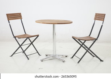 Wooden Chairs And Cafe Table