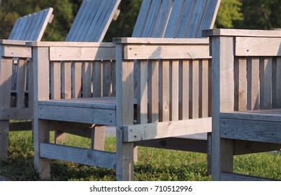 Wooden Chairs Overlooking  Lake Mille Lacs Up Northern In Minnesota At Cabin In The Woods. 