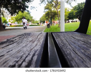 Wooden Chairs In The Park, Low Angle Shot (selective Focus)