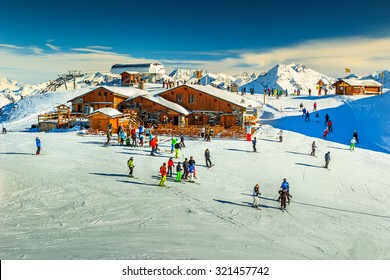 Wooden chalets and ski slopes in the French Alps,Les 3 Vallees,Menuires,France,Europe