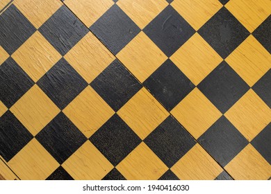 Wooden Chess Board Above White Background.