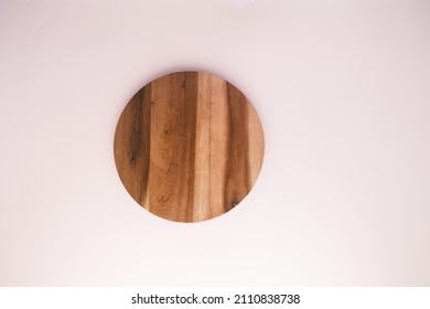 wooden chopping board on color background top down  - Shutterstock ID 2110838738