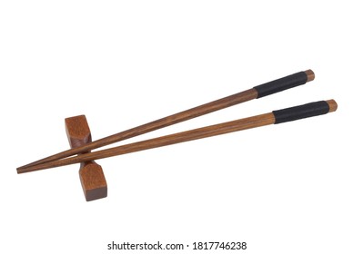 Wooden chopsticks with holder isolated on white background, Japanese style - Powered by Shutterstock