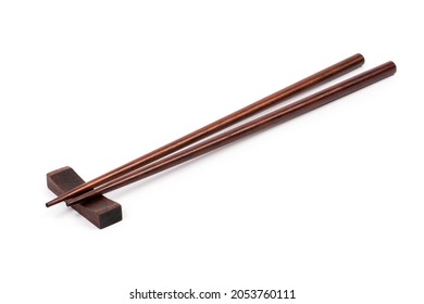 Wooden chopsticks isolated on white background. Top view of wooden chopsticks