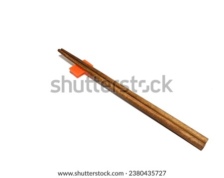 Wooden chopsticks isolated on white background. Food props