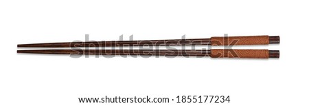 wooden chopsticks kitchenware used for scooping food isolated on white background.
