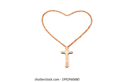 Wooden Christian Cross Necklace Isolated On White Background.