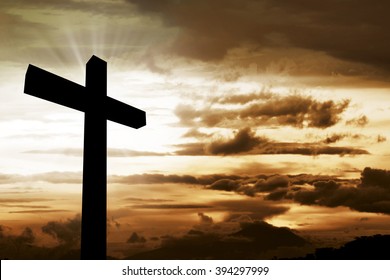 Wooden christian cross. Religious concept image - Shutterstock ID 394297999