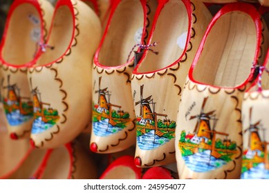 Wooden clogs with picture of windmill in souvenir store in Netherlands
