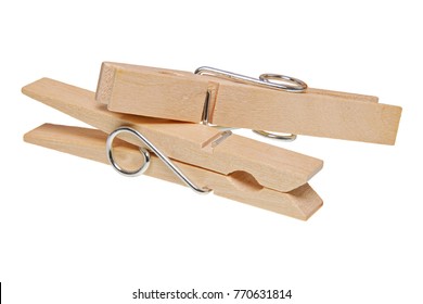 Wooden clothes pegs isolated on a white background