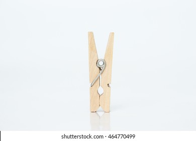 Wooden Clothes Pin On White Background.