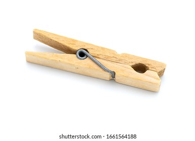 Wooden clothespin on a white background