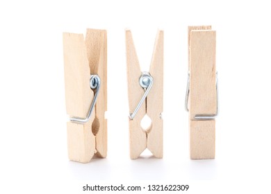 Wooden clothespins isolated on white background