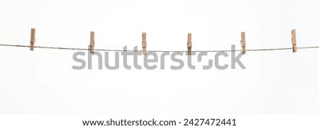 Image, Stock Photo Clothespins hanging on the line