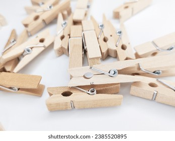 wooden clothespins scattered around - photos of wooden clothespins - wooden clothespins