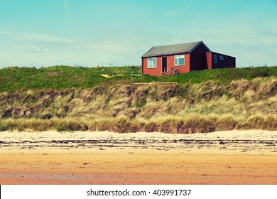 A Wooden Coastal Holiday Home In The North East Of England. UK. Colour Styling And Grain Applied.