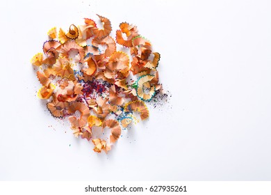 Wooden Colored Pencil Sharpening Shavings Pile On White Isolated Background, Top View, Flat Lay, Copy Space