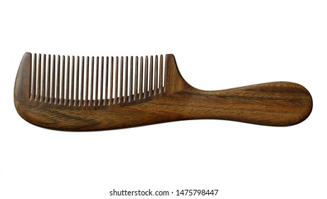 Wooden comb isolated on white background with clipping path.
