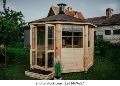 Wooden conceptual project of tiny house with transparent glass walls - Powered by Shutterstock