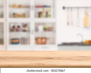wooden counter top with kitchen cabinet background - Shutterstock ID 303275867