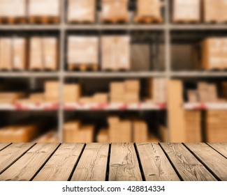 Wooden Counter With Warehouse Blurred Background