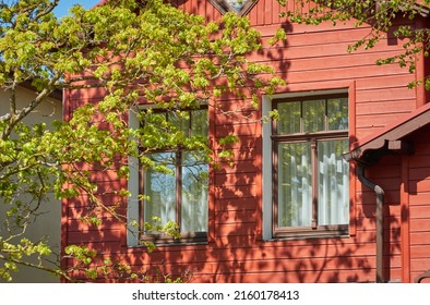 Wooden Country House Exterior. Classical Building Traditions. Falu Red Dye. Scandinavia, Europe. Tourism, Vacations, Home Office, Real Estate Development, Lifestyle