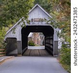 A Wooden Covered Bridge In Woodstock, Vermont, In The Fall
