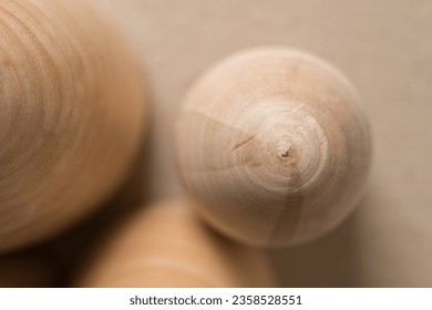 wooden crafting ovoid objects on paper
